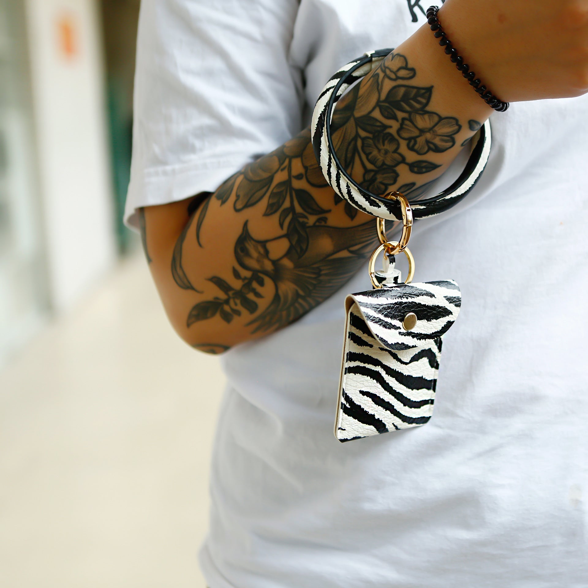 Venta al por mayor Borla Monedero PU Llaveros