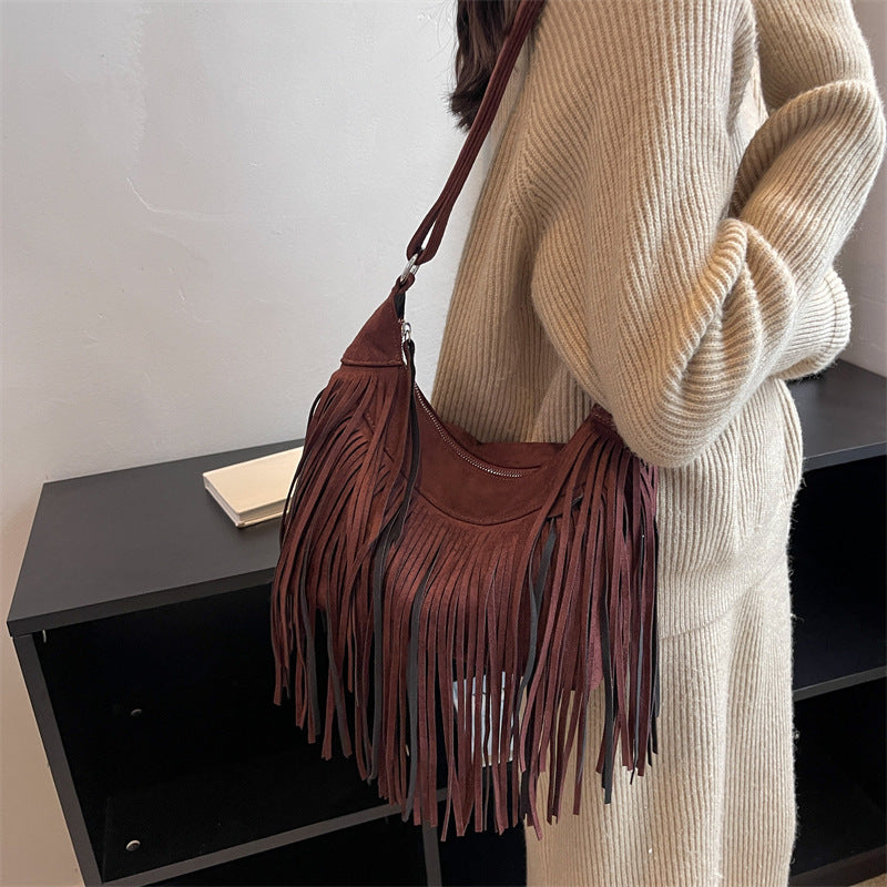 Venta al por mayor Bolso de hombro con borla esmerilada de poliéster