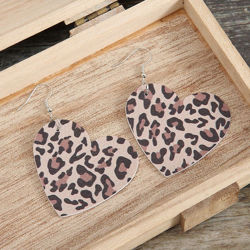 Venta al por mayor Pendientes de cuero de corazón de leopardo de San Valentín