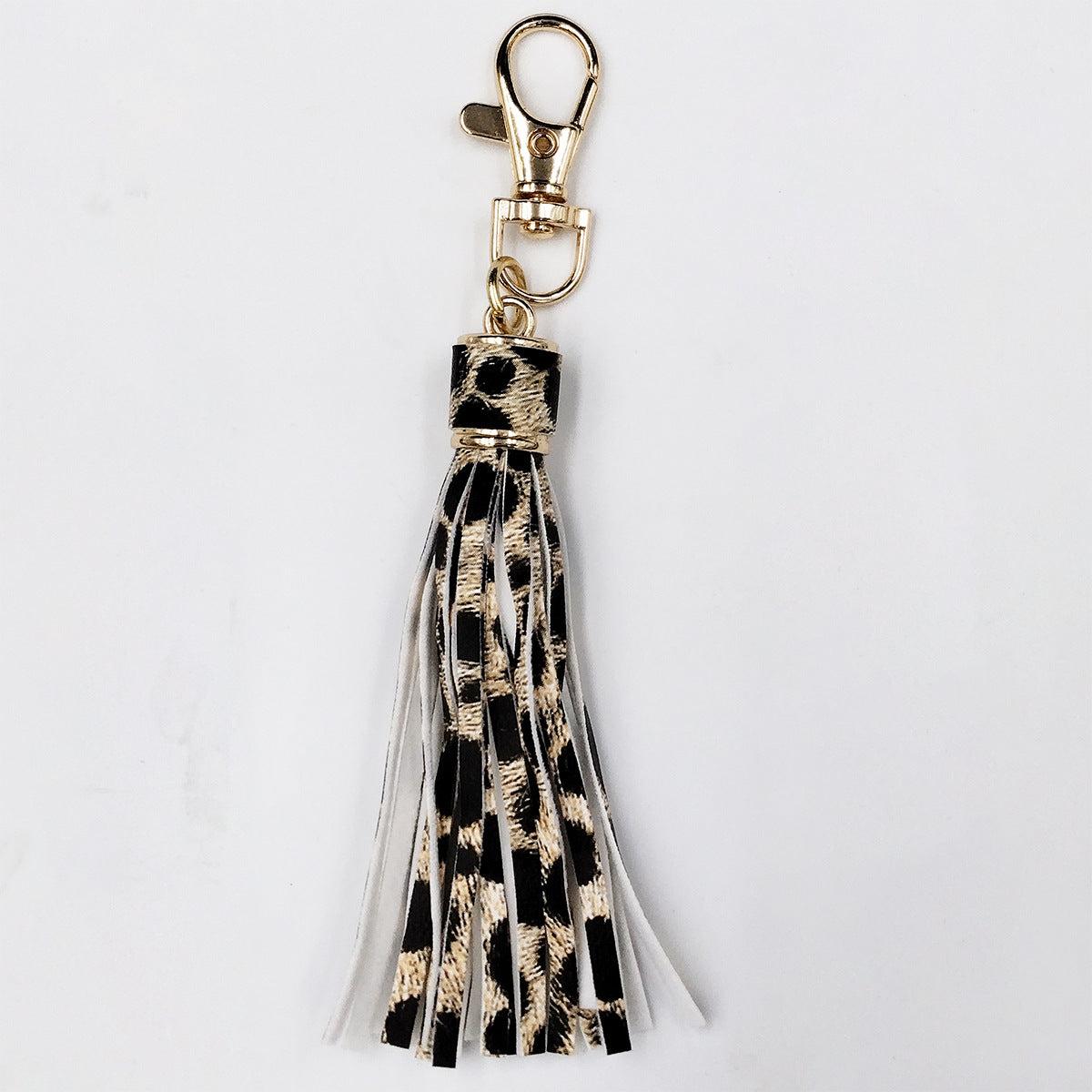 Llavero al por mayor de la borla del cuero del modelo de la vaca del leopardo de la PU