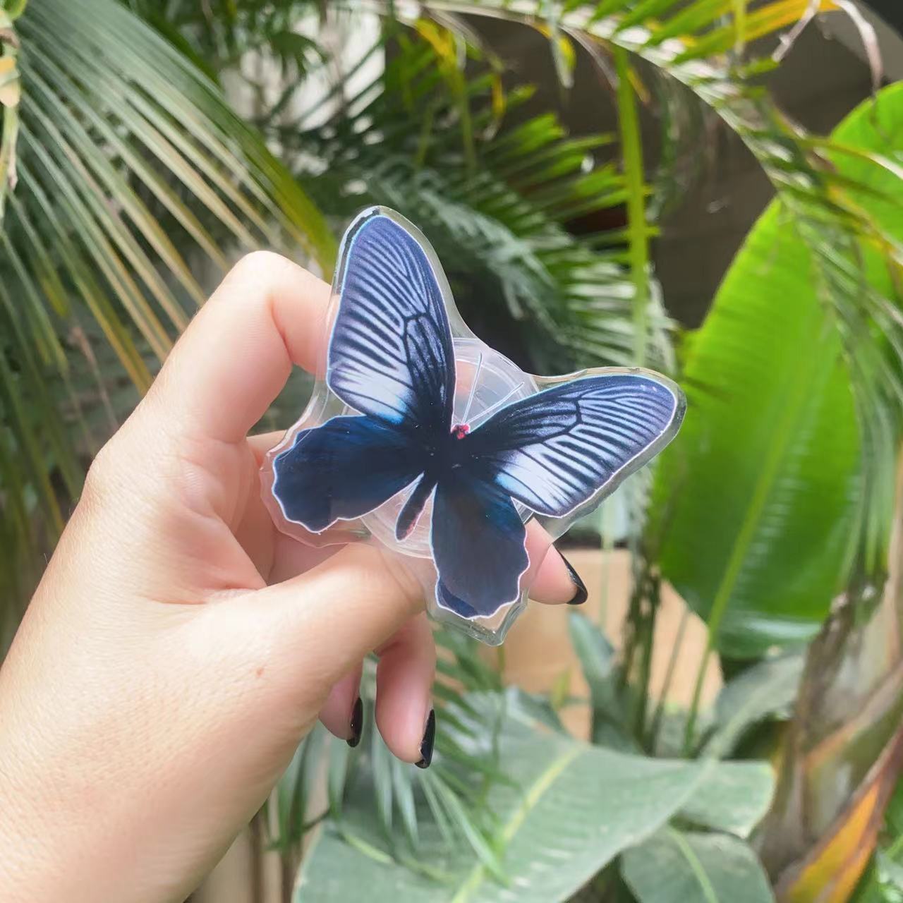 Venta al por mayor Soporte de teléfono móvil de mariposa pintada de acrílico