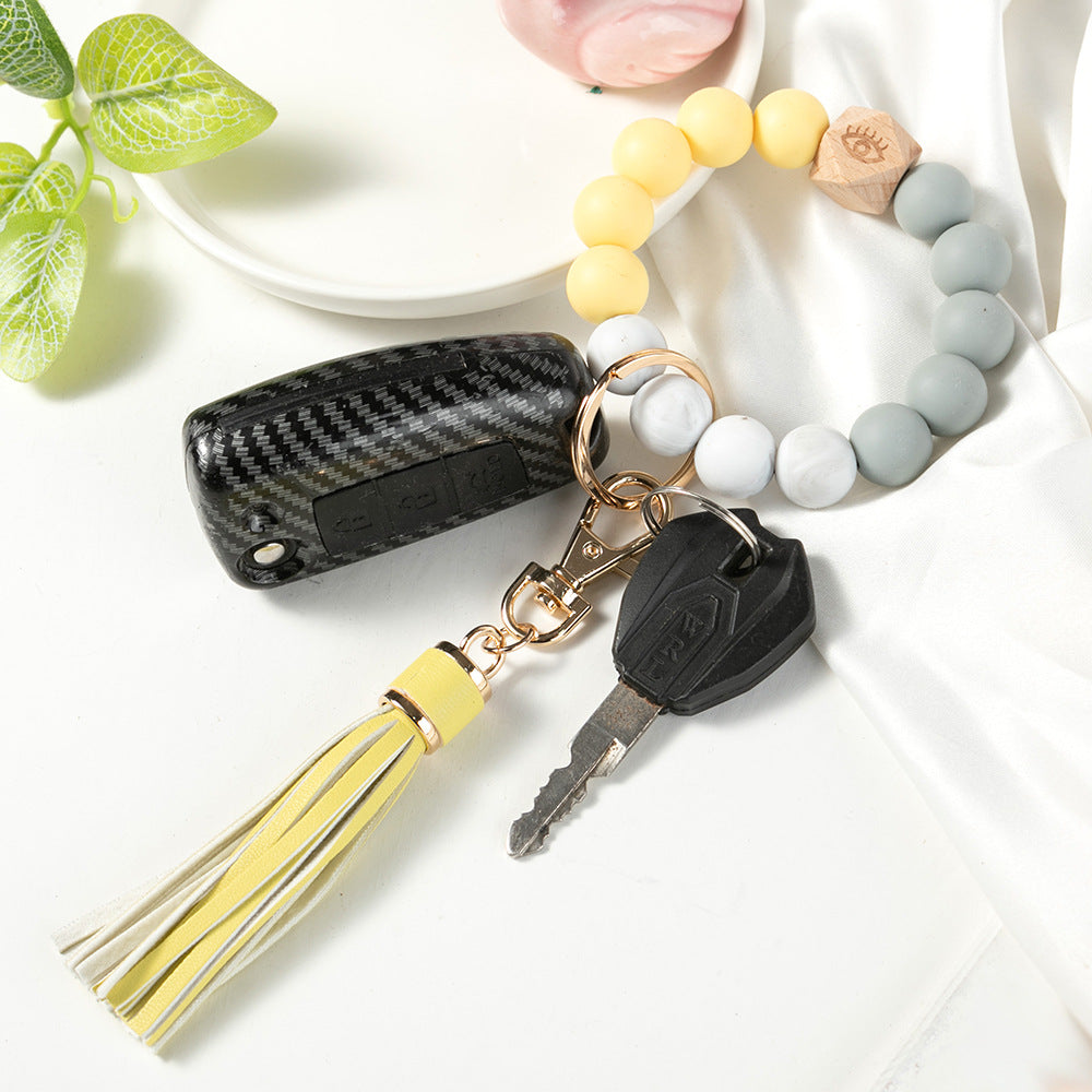 Llavero de muñeca con cuentas de madera de arcilla polimérica al por mayor