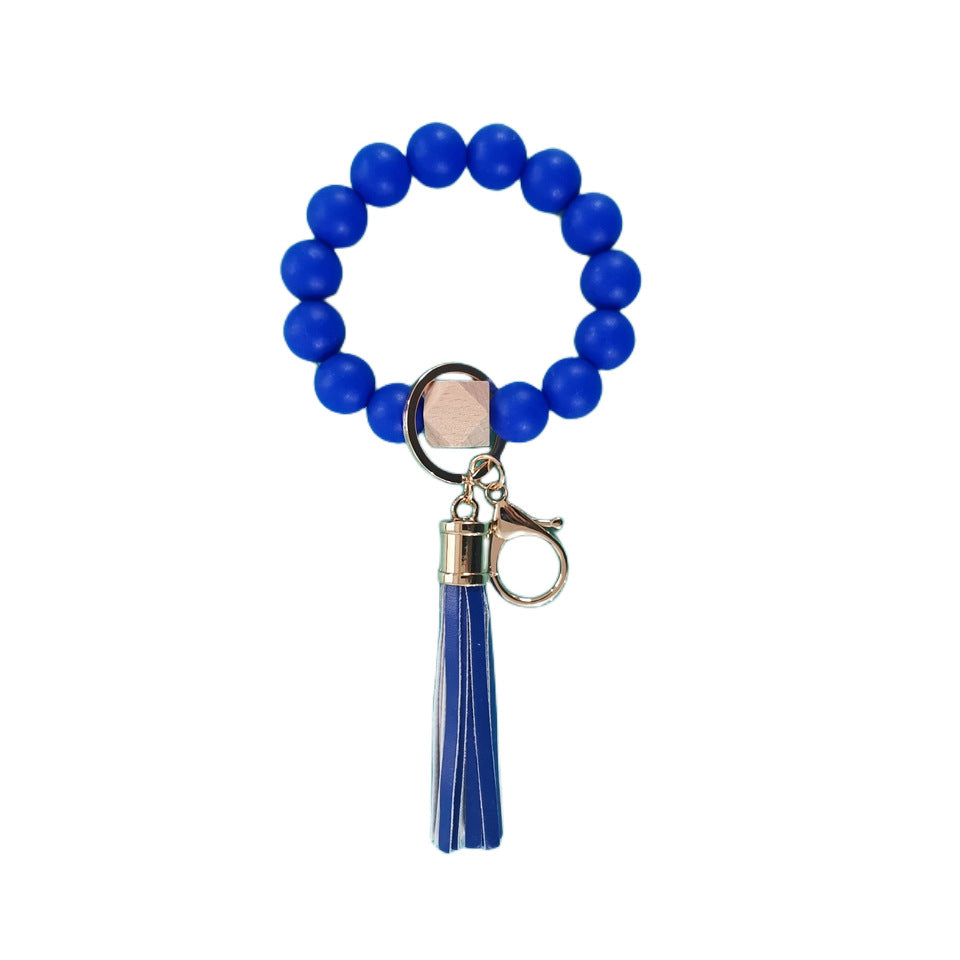 Venta al por mayor Llavero de muñeca con cuentas de silicona de girasol