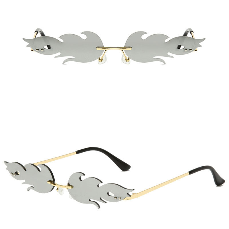 Venta al por mayor de PC llama gafas de sol sin marco en forma de metal para damas