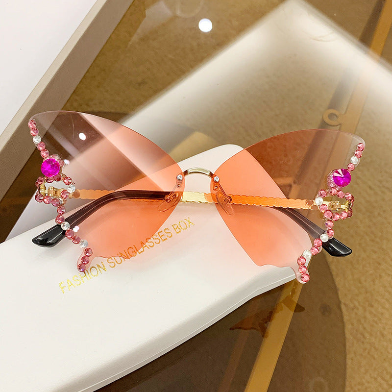 Wholesale Butterfly Shape Diamond Rimless PC Sunglasses