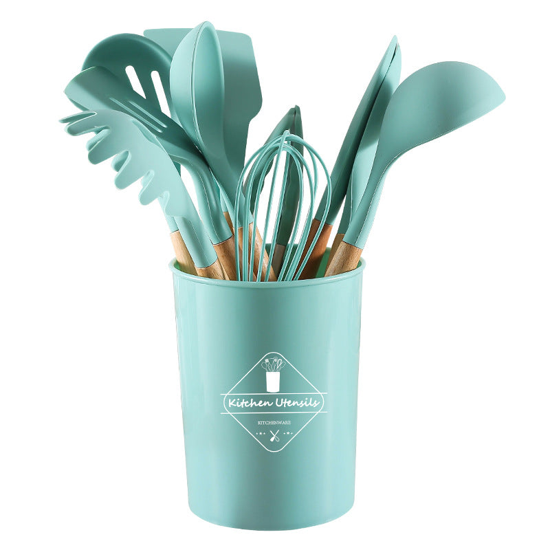 Venta al por mayor Mango de madera Utensilios de cocina de silicona Juego de once piezas