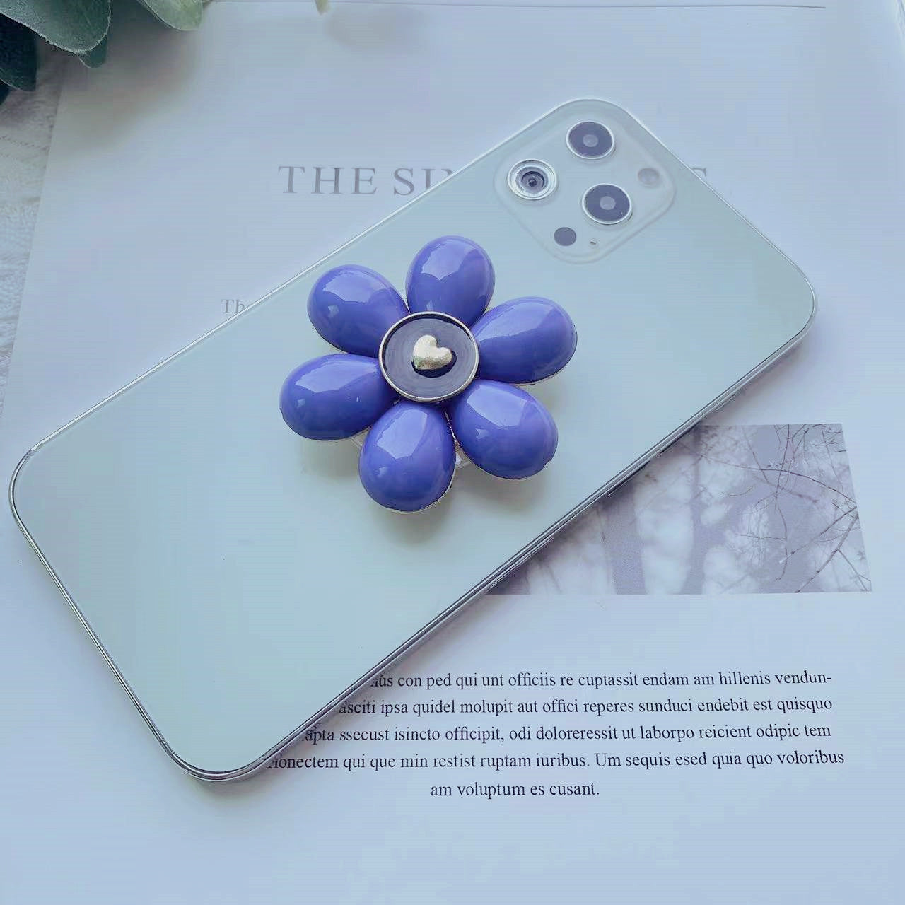 Soporte de teléfono móvil plegable Camellia de resina al por mayor