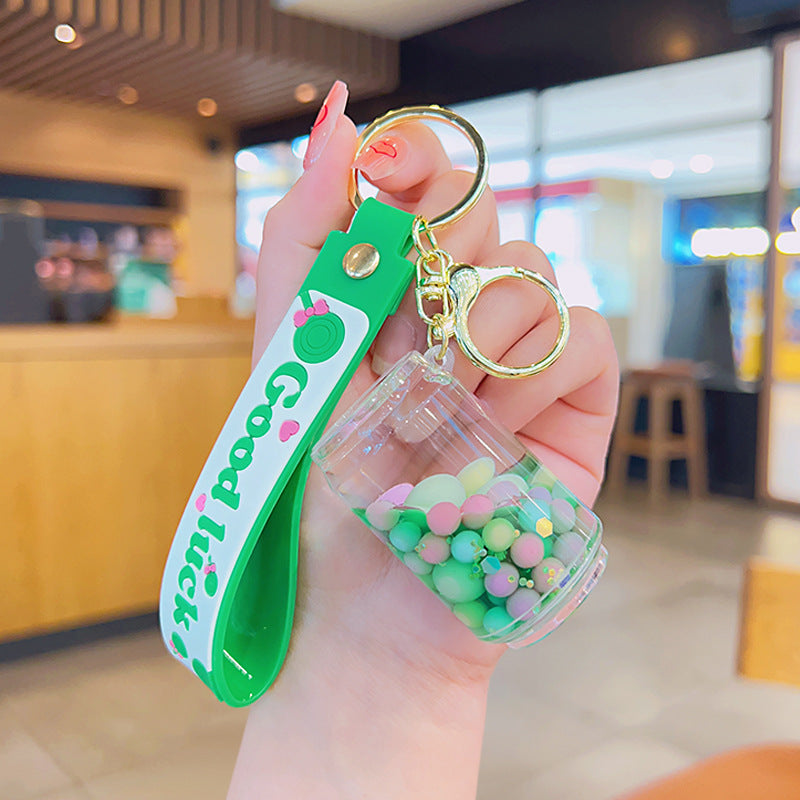 Wholesale Acrylic Green Liquid Into The Oil Quicksand Bottle Series Key Chain