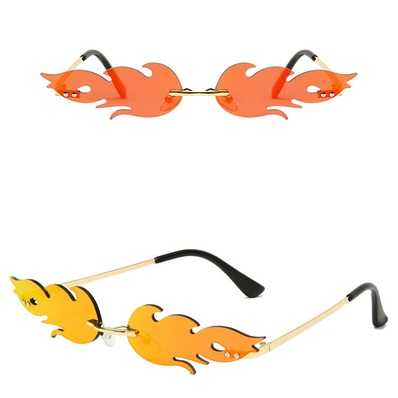 Venta al por mayor de PC llama gafas de sol sin marco en forma de metal para damas