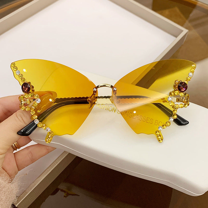 Wholesale Butterfly Shape Diamond Rimless PC Sunglasses