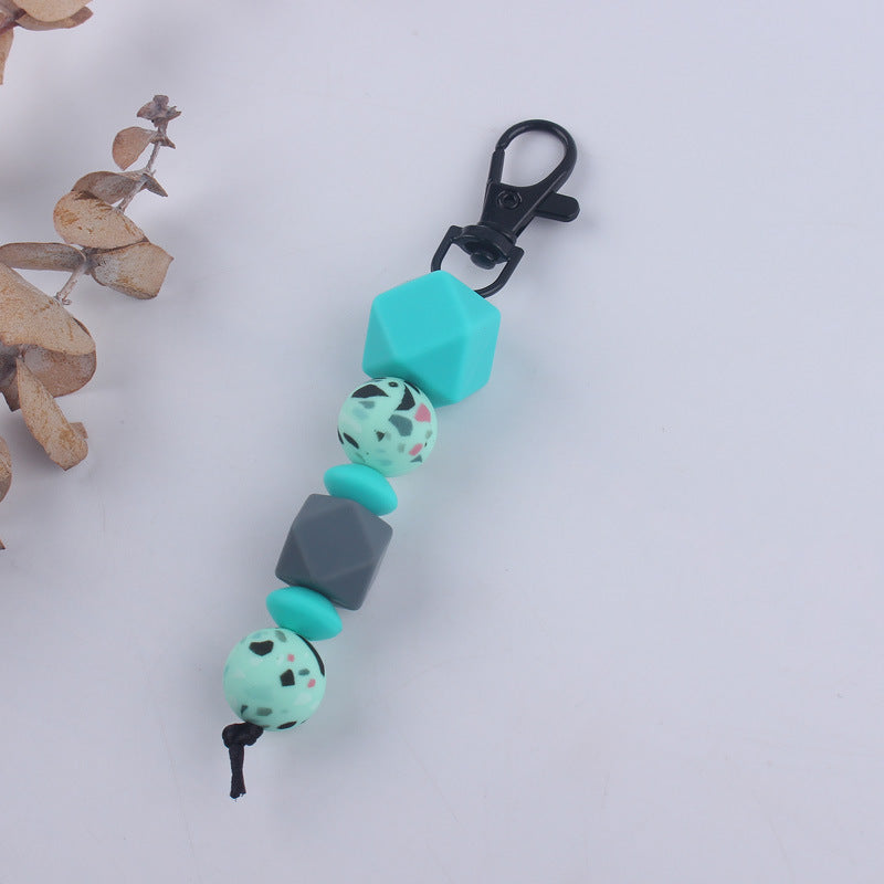 Llavero con cuentas de leopardo de silicona al por mayor