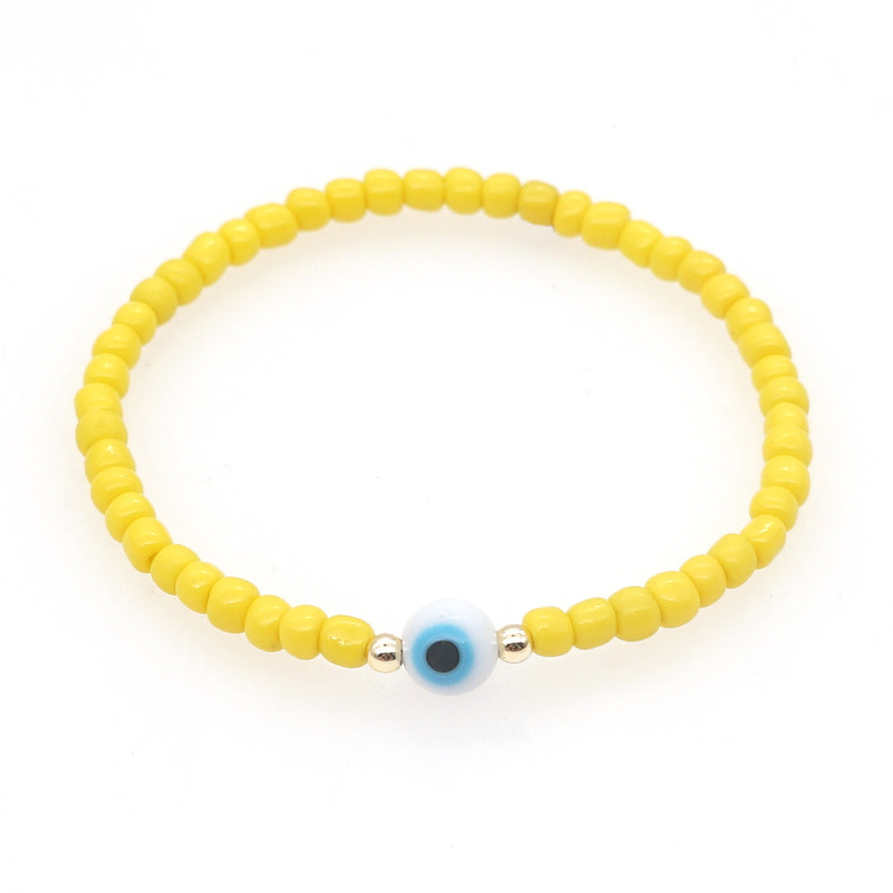 Venta al por mayor Devil Eyes White Glass Rice Beads Bracelet