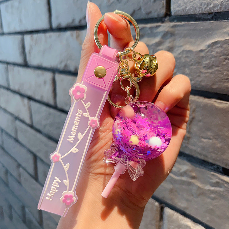 Piruleta de acrílico al por mayor en el llavero creativo de la arena movediza del aceite