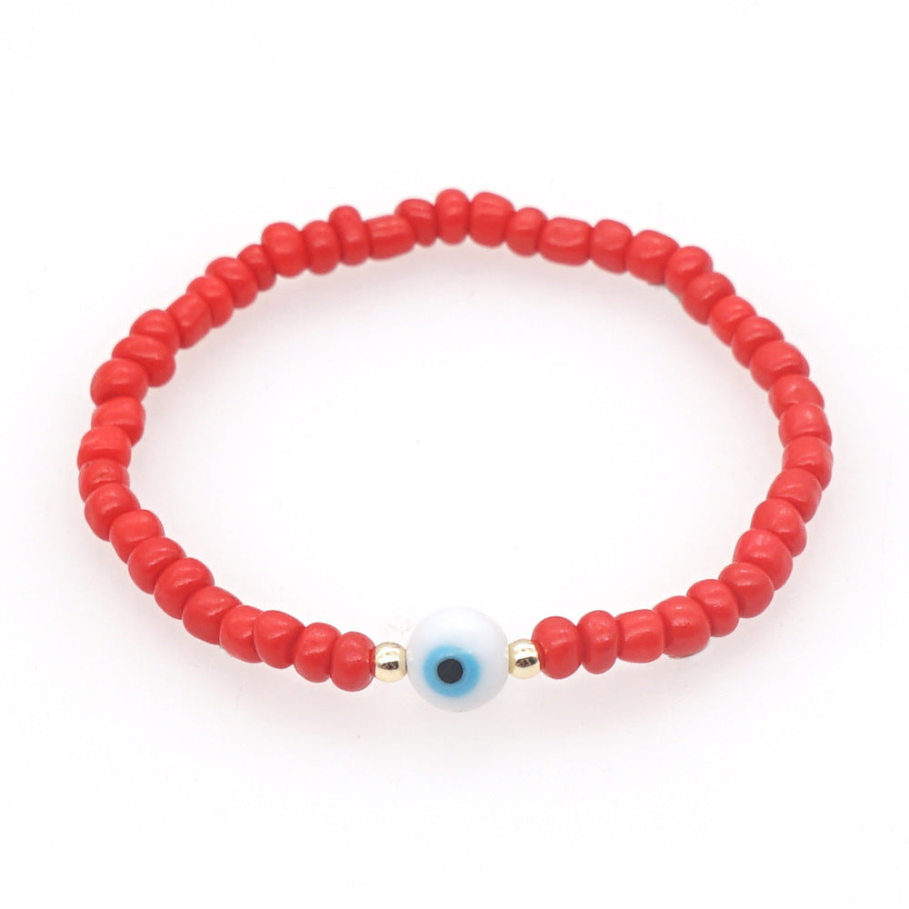 Venta al por mayor Devil Eyes White Glass Rice Beads Bracelet