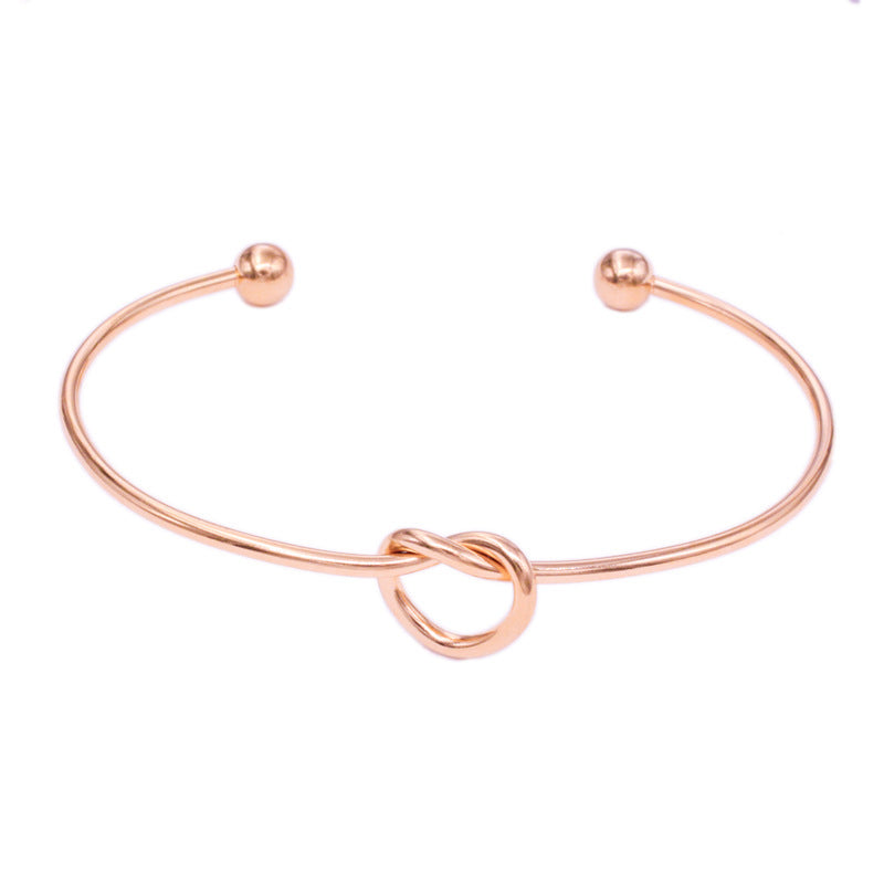 Pulsera De Acero De Titanio Con Corazón Anudado al por mayor