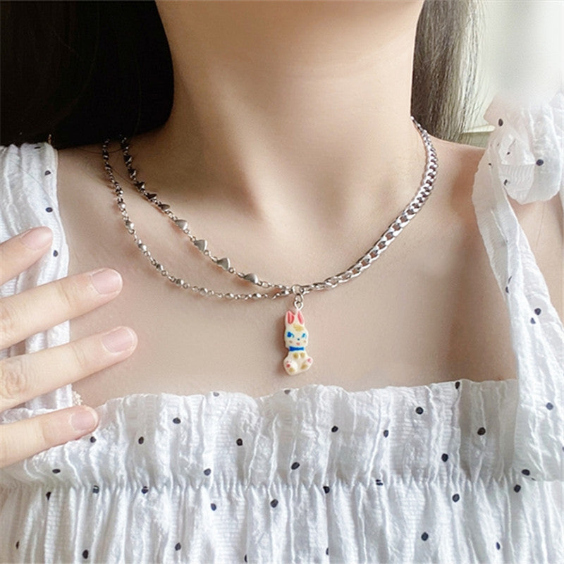 Venta al por mayor Pearl Bunny Collares De Acero De Titanio