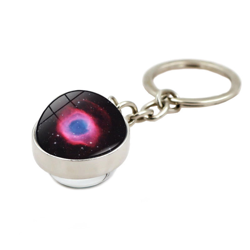 Llavero creativo al por mayor de la nebulosa de la galaxia del ojo de Dios de la aleación del cinc