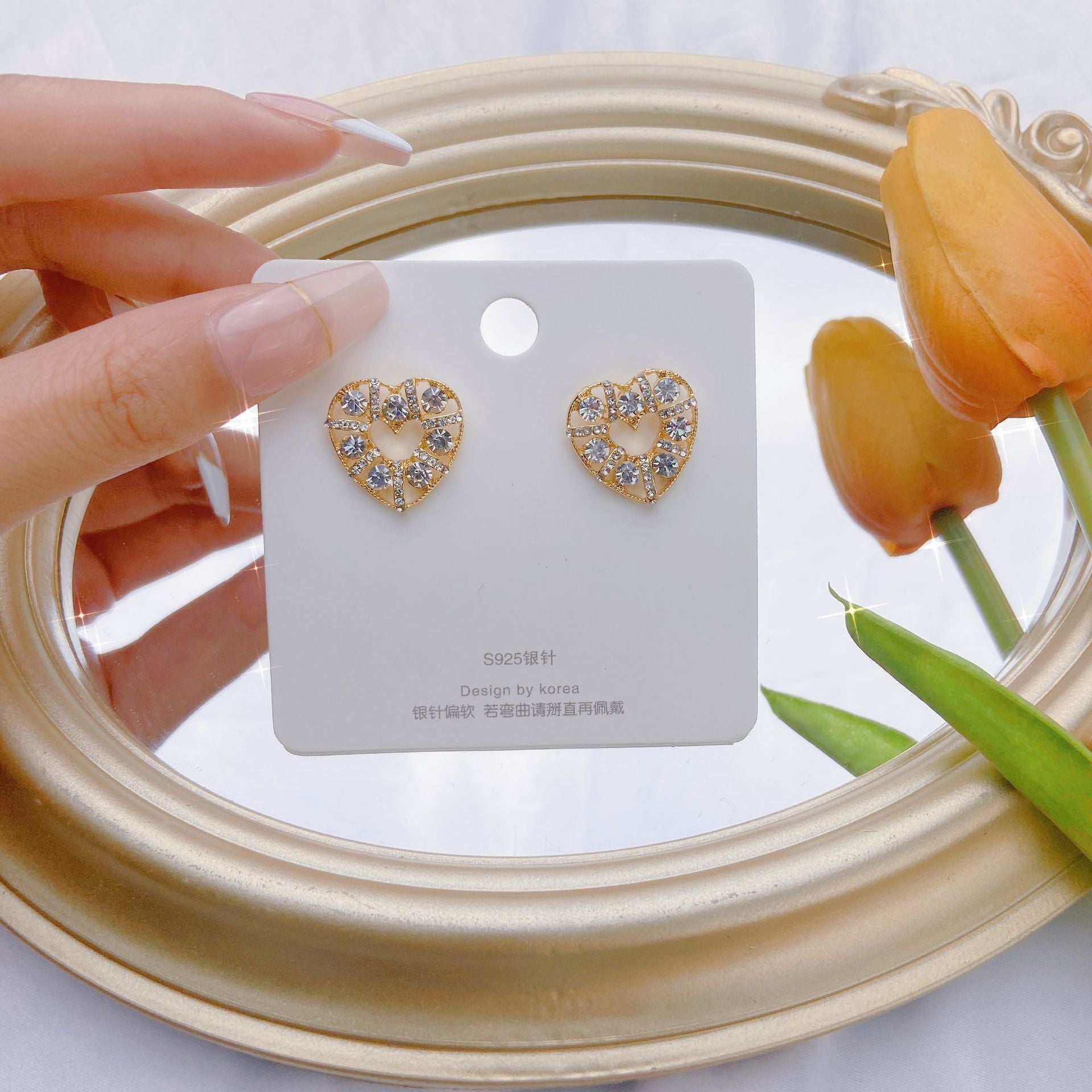 Wholesale Hollow Pearl Heart Alloy Earrings
