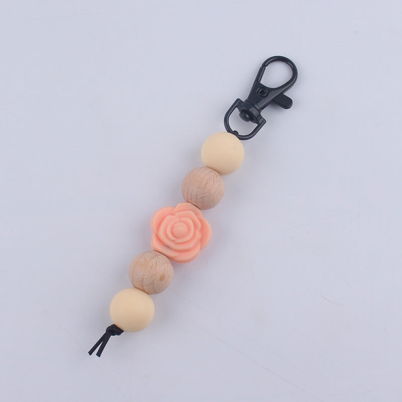 Llavero de cuentas de madera de rosa de silicona al por mayor