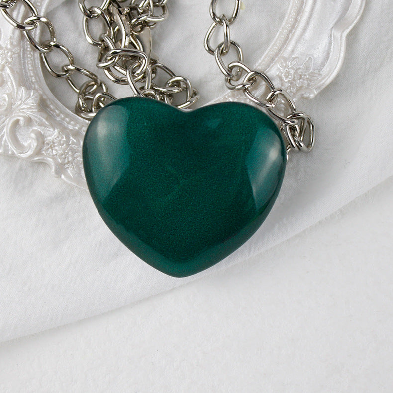 Soporte de teléfono de vidrio de corazón pequeño de melocotón al por mayor