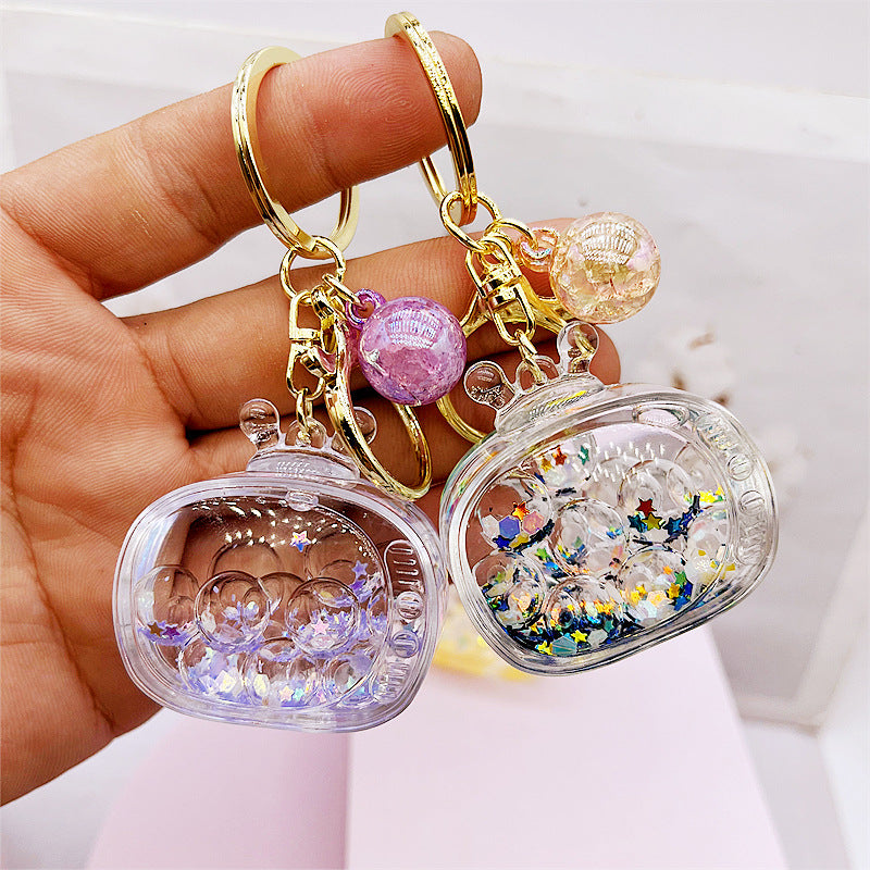 Comercio al por mayor acrílico transparente líquido arenas movedizas llavero creativo