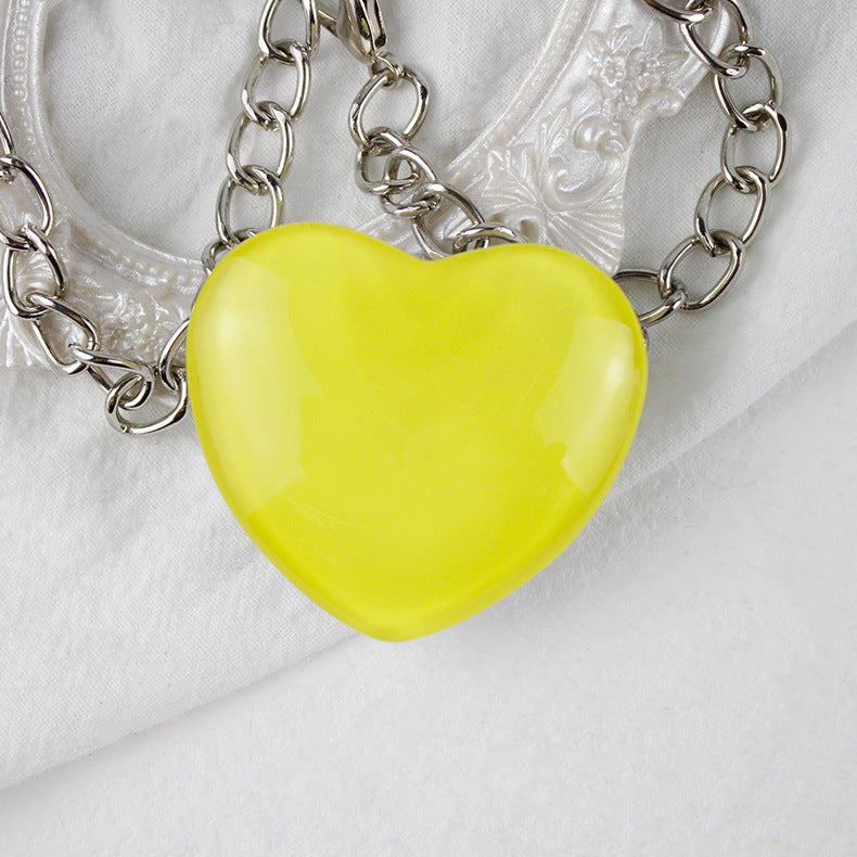 Soporte de teléfono de vidrio de corazón pequeño de melocotón al por mayor