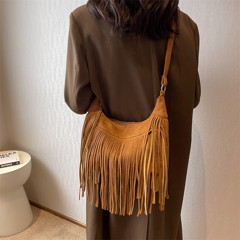 Venta al por mayor Bolso de hombro con borla esmerilada de poliéster