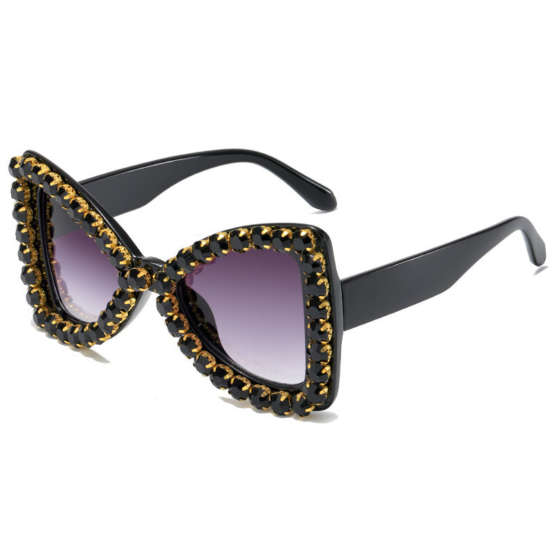 Venta al por mayor de marco grande Bowknot diamante PC gafas de sol