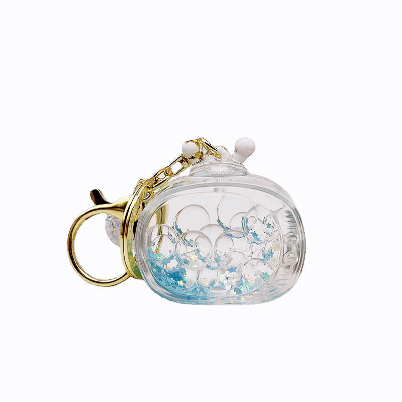 Comercio al por mayor acrílico transparente líquido arenas movedizas llavero creativo
