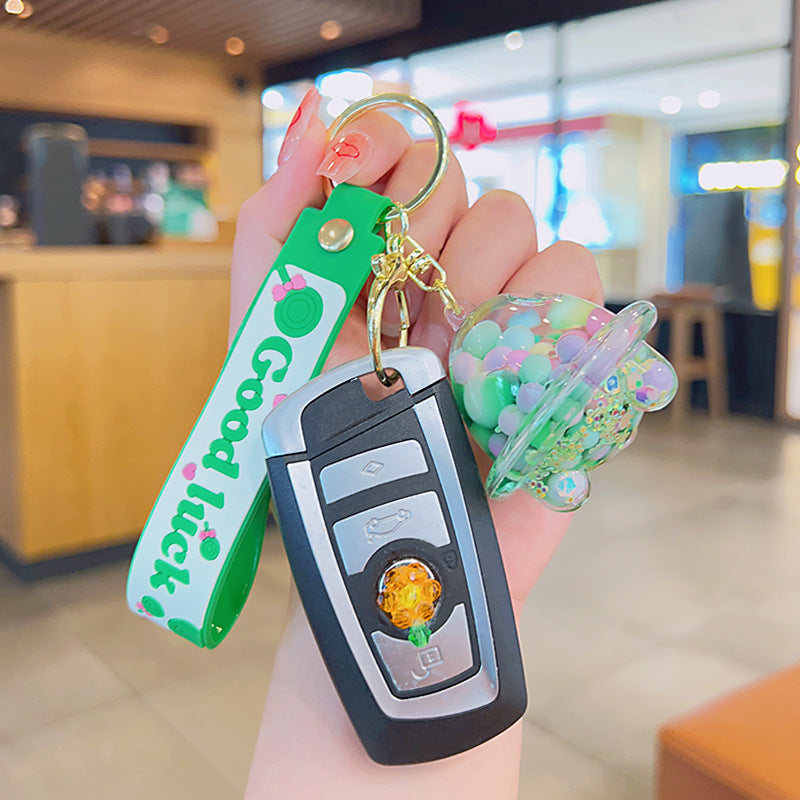 Wholesale Acrylic Green Liquid Into The Oil Quicksand Bottle Series Key Chain