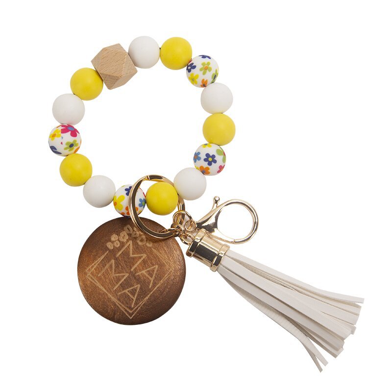 Wholesale MAMA Listed Wood Chip Cow Print Beads Silicone Key Chain