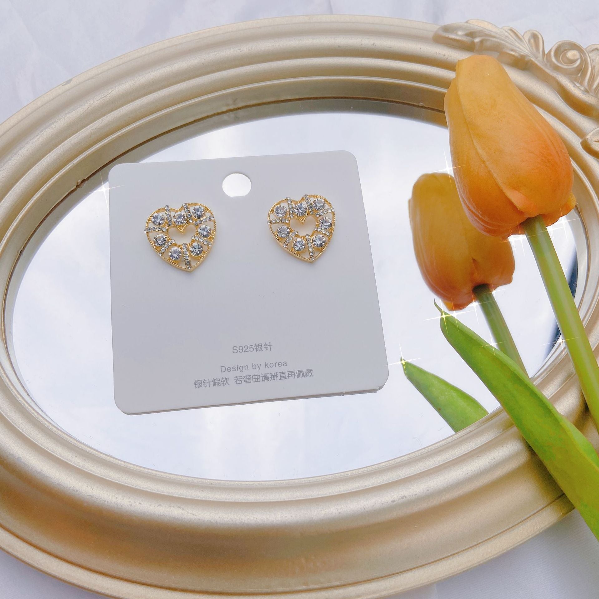 Wholesale Hollow Pearl Heart Alloy Earrings