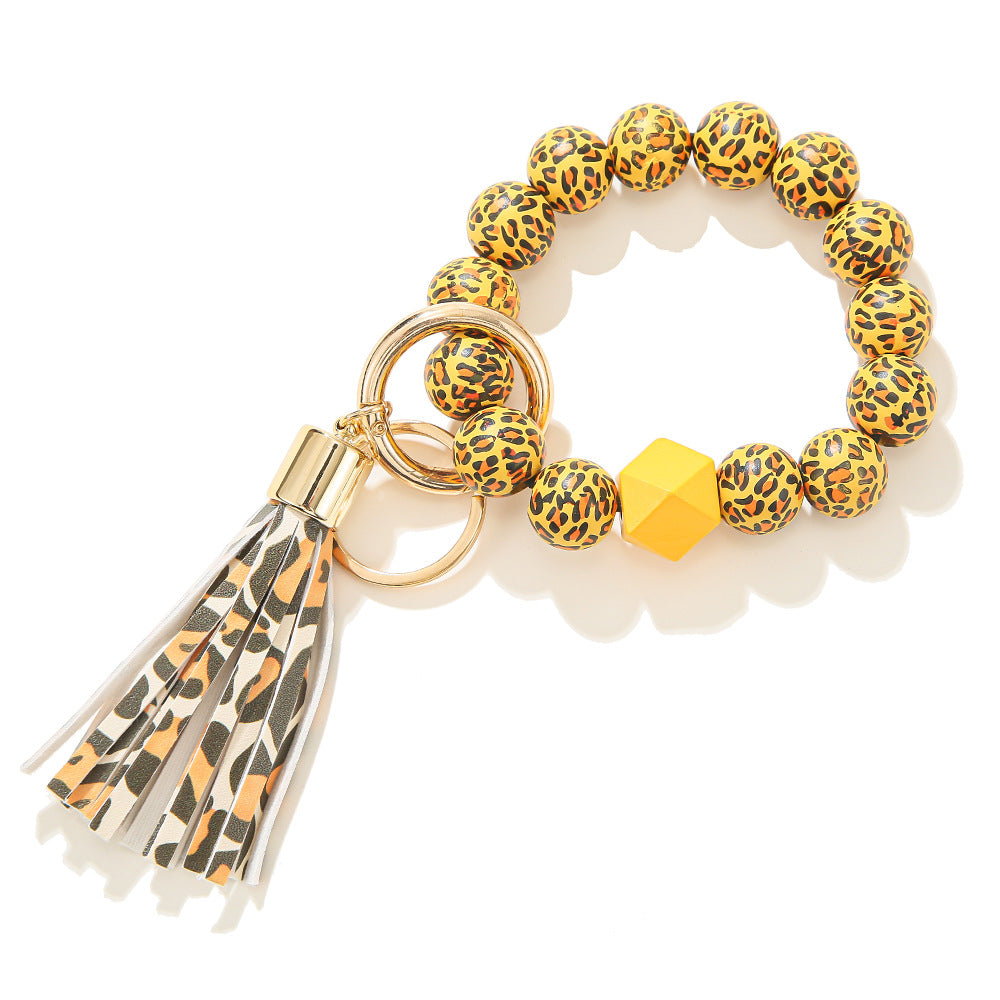 Llavero de muñeca con cuentas de madera con patrón manchado al por mayor