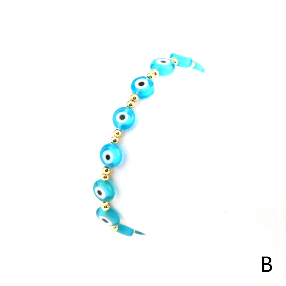 Venta al por mayor Pulsera De Cristal De Color Mezclado De Globo Ocular