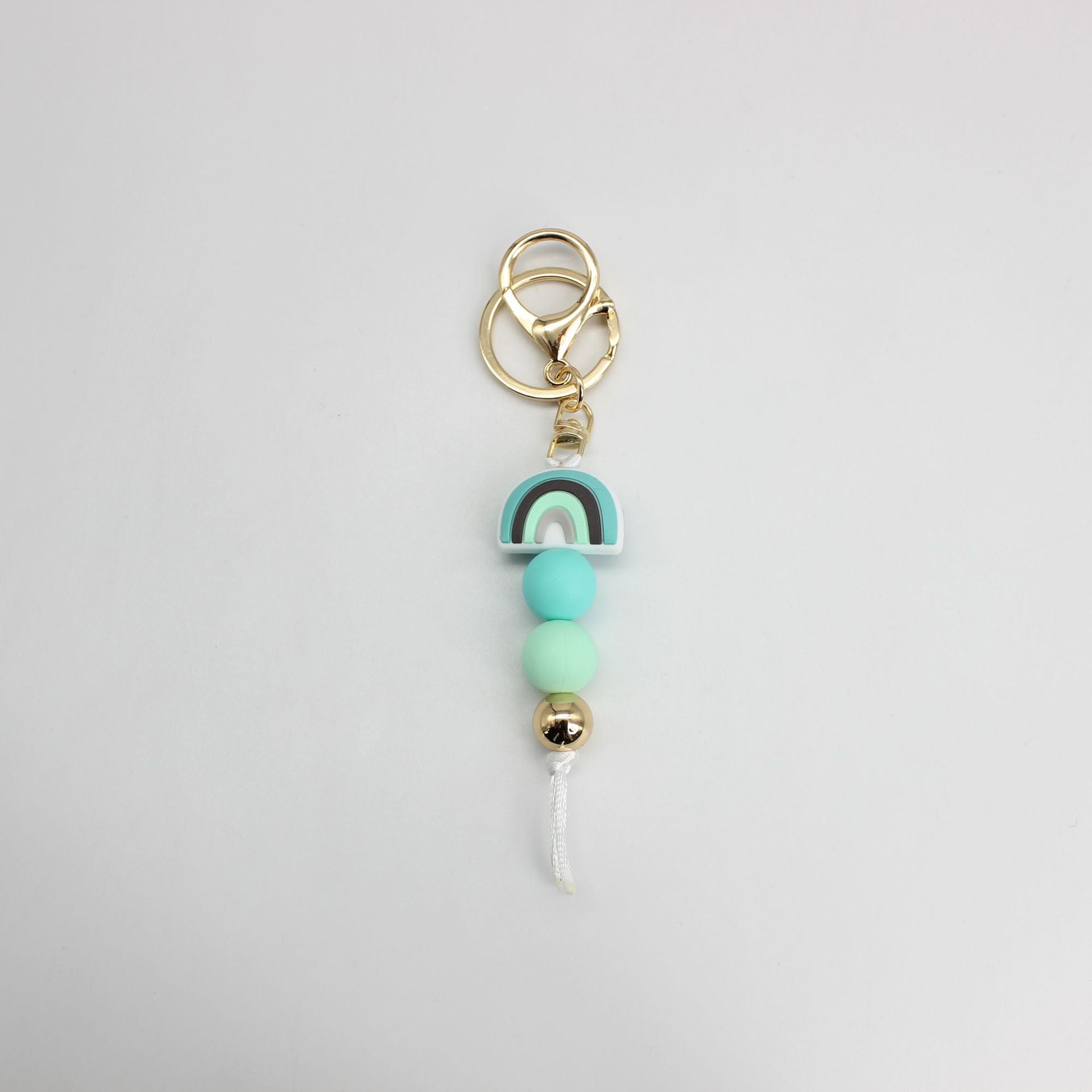Venta al por mayor Llavero Con Cuentas De Silicona Arco Iris