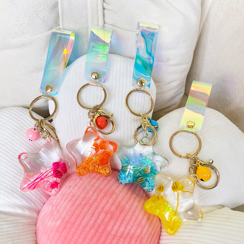 Acrílico al por mayor en el llavero creativo de la arena movediza de la estrella de cinco puntas de la flor seca del aceite