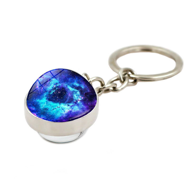 Llavero creativo al por mayor de la nebulosa de la galaxia del ojo de Dios de la aleación del cinc