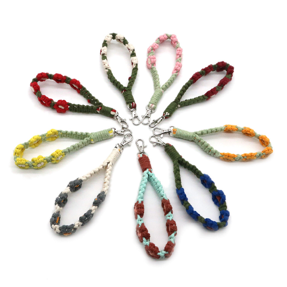 Venta al por mayor Llavero trenzado de flor pequeña de metal