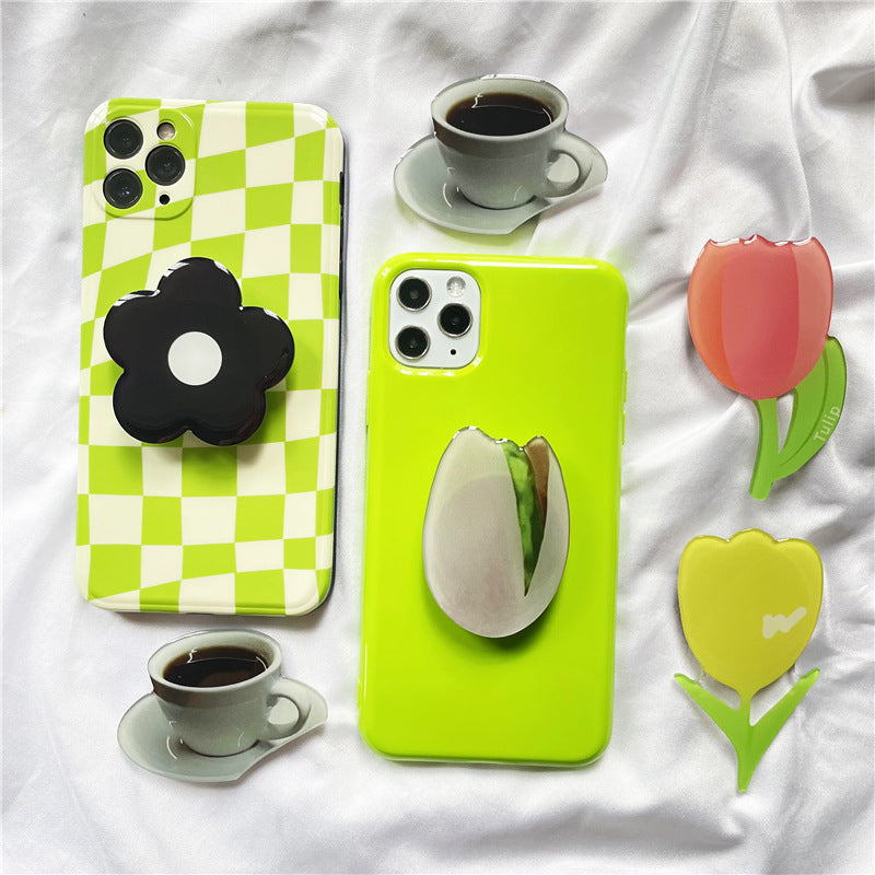 Venta al por mayor Torta de simulación Acrílico Airbag Soporte para teléfono móvil