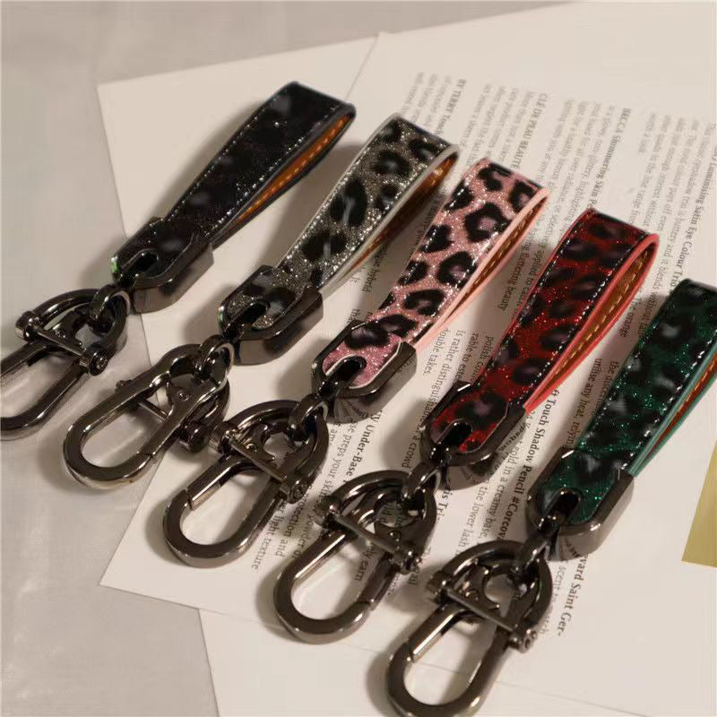 Wholesale 10PCS Zinc Alloy Double-sided Leopard Print Keychain