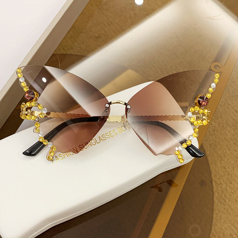 Wholesale Butterfly Shape Diamond Rimless PC Sunglasses