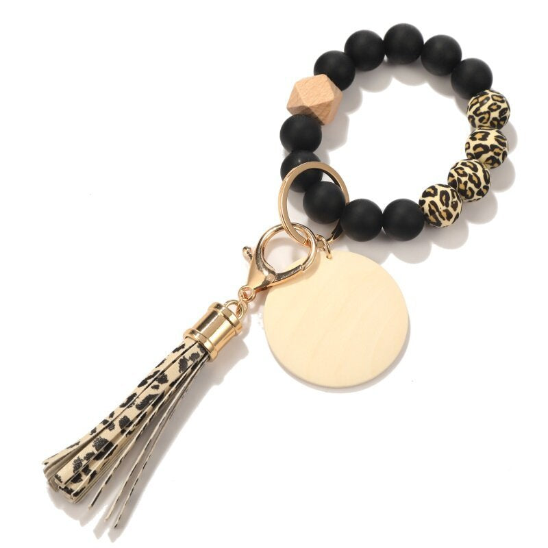 Llavero de muñeca con cuentas de silicona con flecos de marca de madera en blanco al por mayor