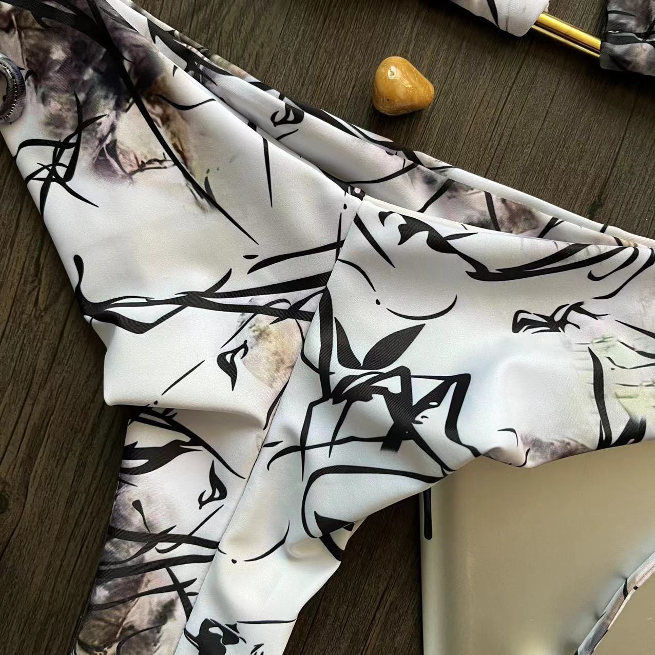 Traje de baño de poliéster dividido de nueva impresión al por mayor