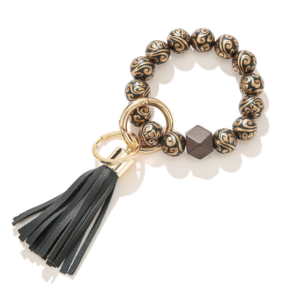 Llavero de muñeca con cuentas de madera con patrón manchado al por mayor