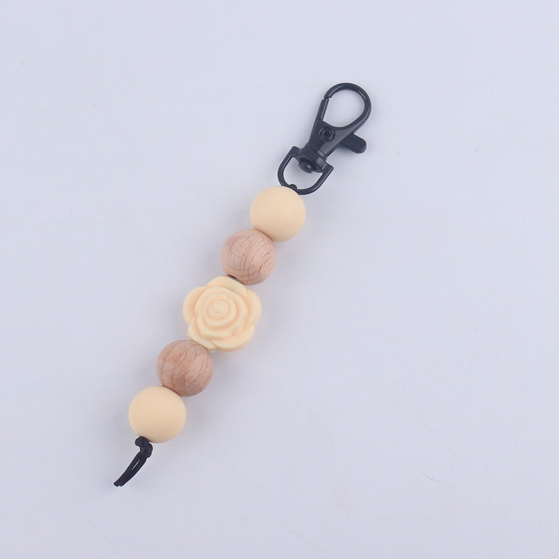 Llavero de cuentas de madera de rosa de silicona al por mayor