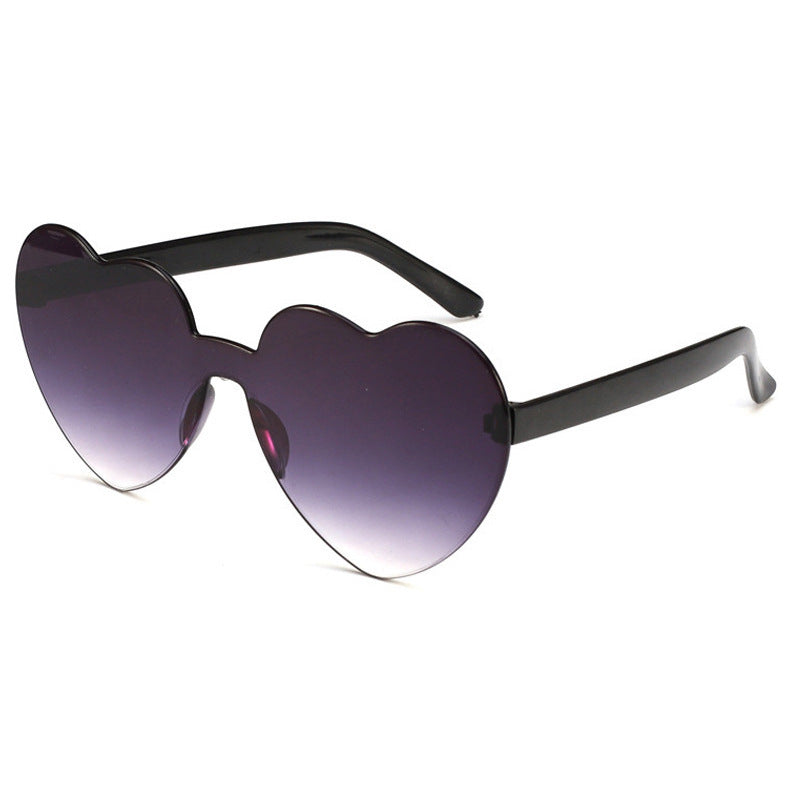 Venta al por mayor Gafas de sol sin marco divertidas para damas PC