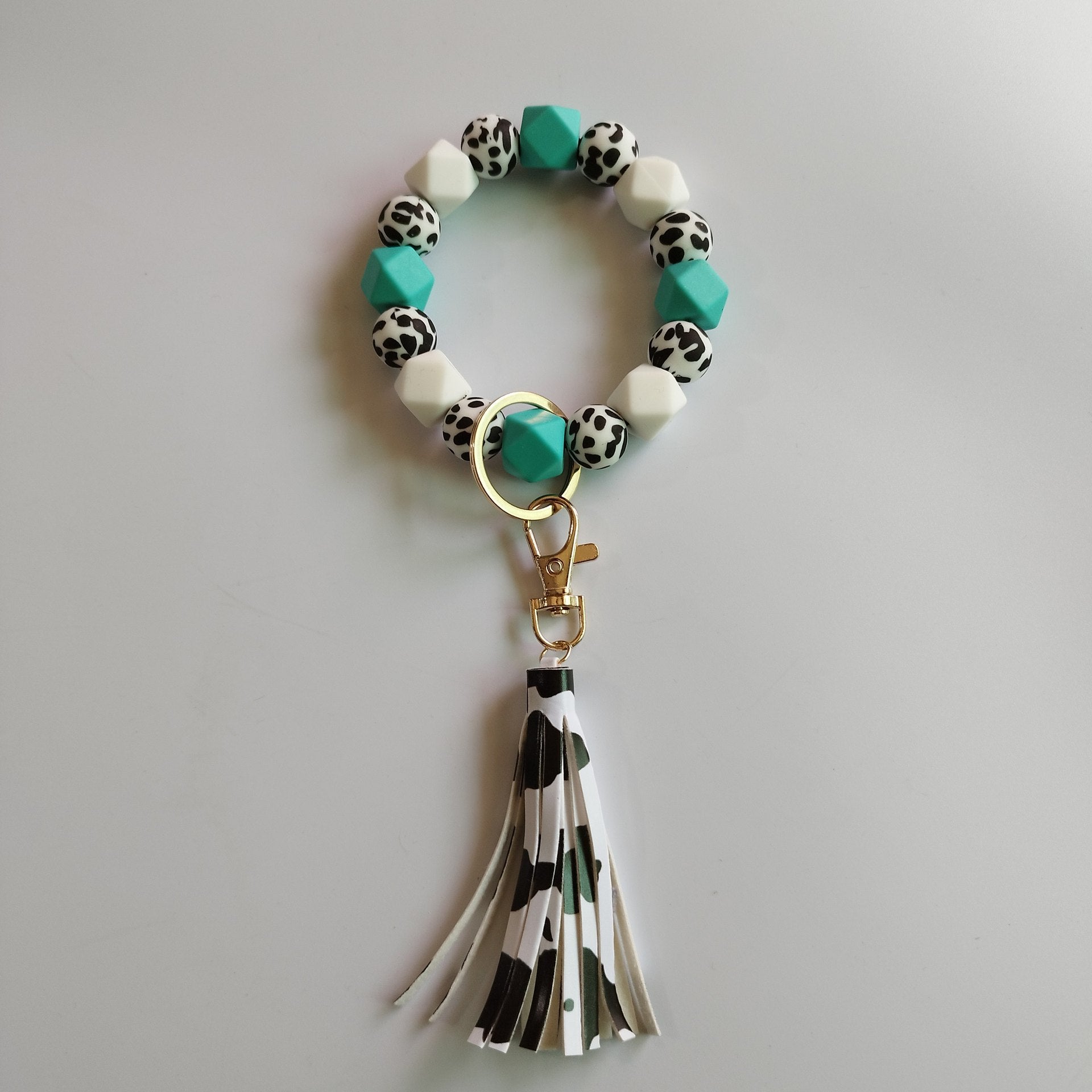 Comercio al por mayor Vaca Fringe Tarjeta Bolsa Silicona Beads Muñeca Llavero