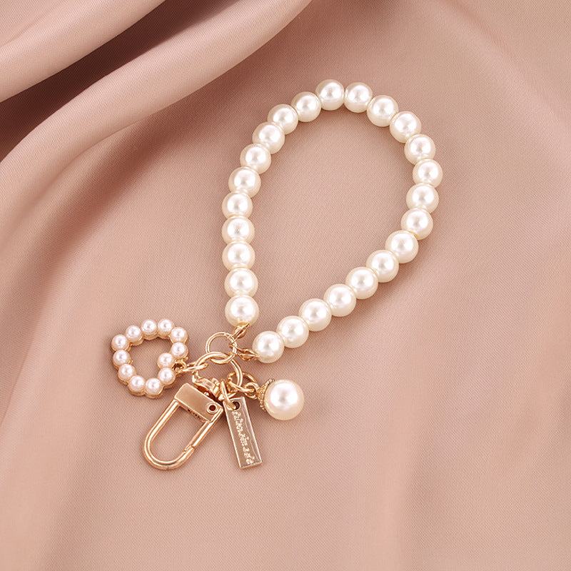 Wholesale Pearl Shell Metal Bracelet Keychain