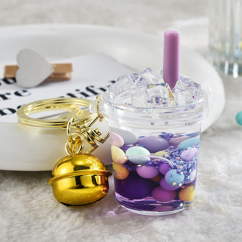 Llavero creativo al por mayor de la botella de la arena movediza de la taza del iceberg de acrílico