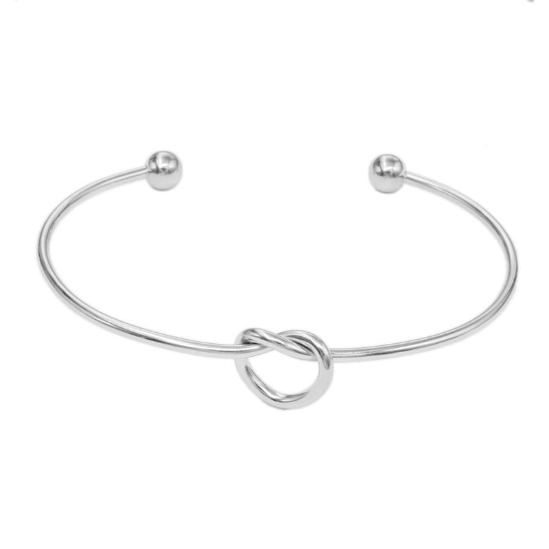 Pulsera De Acero De Titanio Con Corazón Anudado al por mayor